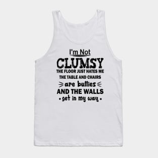 i'm not clumsy the floor just hates me the table and chairs are bullies and the walls get in my way Tank Top